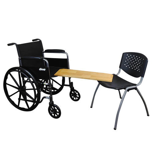 Black wheelchair with a wooden table and black chair on a white background