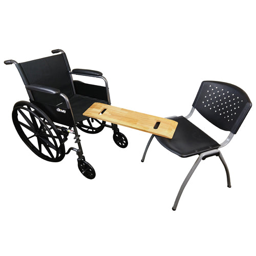 Wheelchair with attached wooden table and black chair on a white background