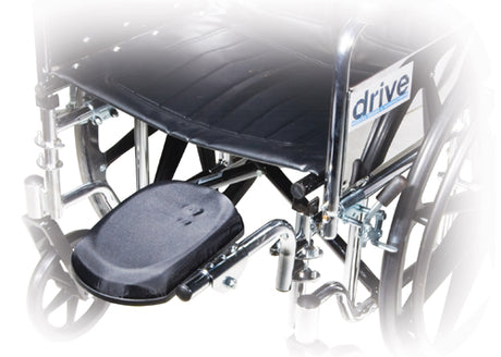 Wheelchair with a footrest on a white background, featuring the 'Drive' brand.